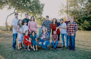 Randi Sue Surratt posing for a photo with her family