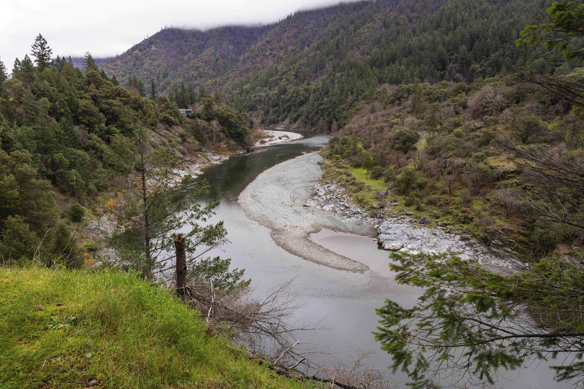 river running through mountains